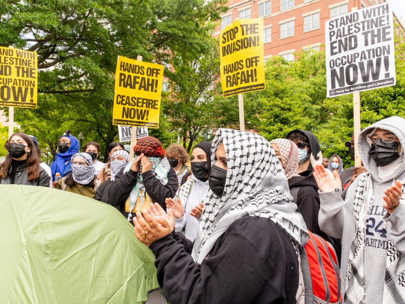 Student activists from around the DMV surround one of the tents at a George Washington University encampment on April 25, calling for a cease-fire in Gaza, where over 34,000 Palestinians have died in Israel's retaliatory response to Hamas terror attacks on Oct. 7. (Ja'Mon Jackson/The Washington Informer)
