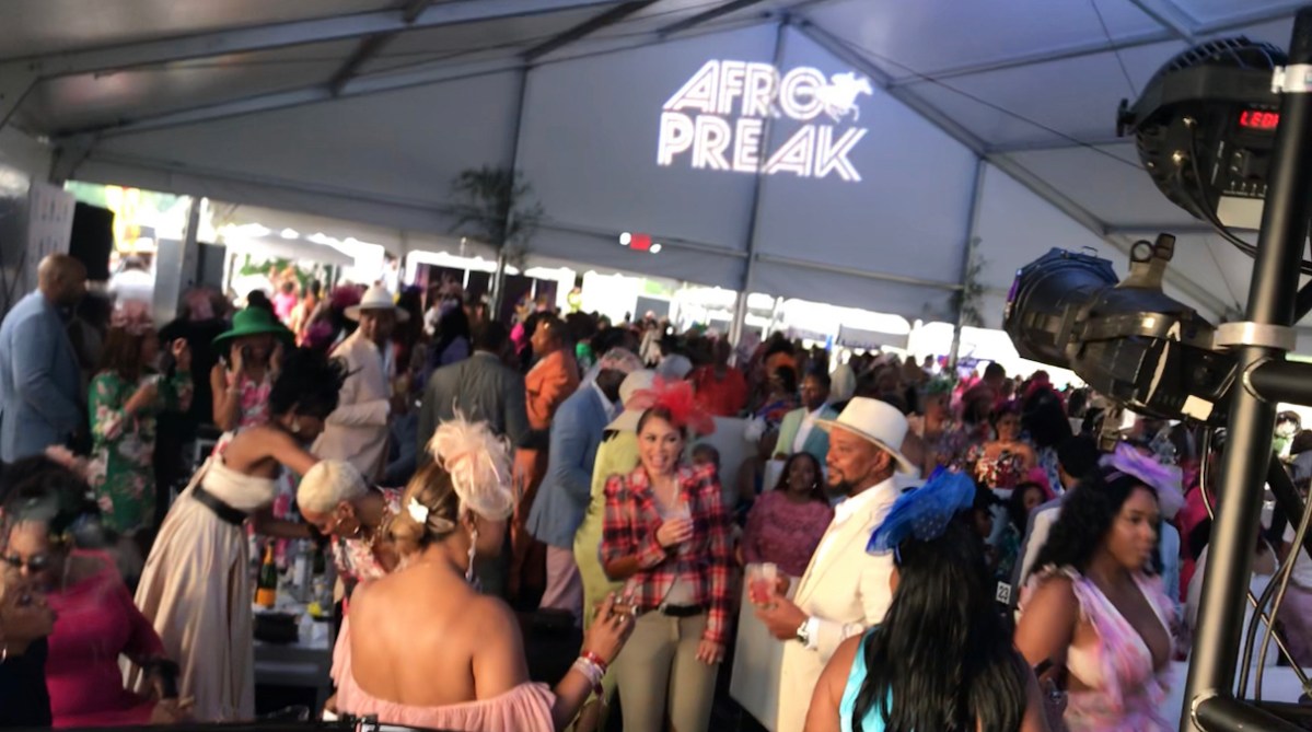 Hundreds gather in the Afro Preak tent for Preakness 149 at Pimlico Race Course in Baltimore, Maryland on Saturday, May 18. (Micha Green/The Washington Informer)