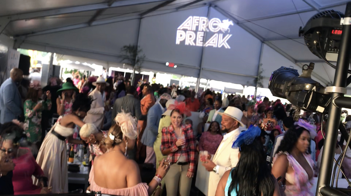 Hundreds gather in the Afro Preak tent for Preakness 149 at Pimlico Race Course in Baltimore, Maryland on Saturday, May 18. (Micha Green/The Washington Informer)