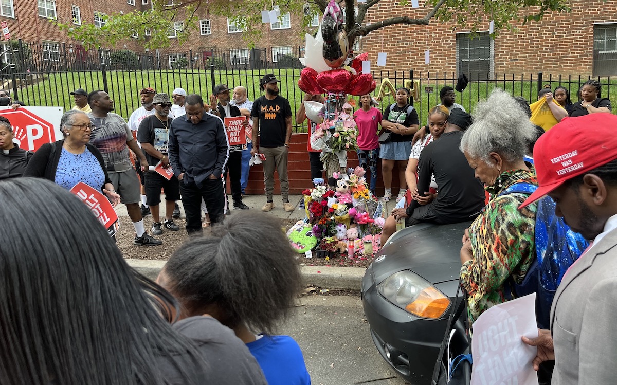 Politicians, local leaders, the Metropolitan Police Department and dozens of pastors come together to offer powerful prayers and community comfort on May 7. (Hamil R. Harris/The Washington Informer)