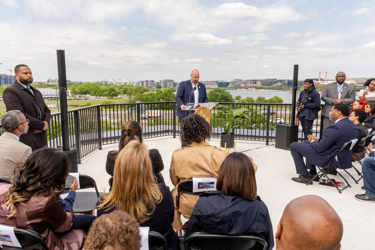 Bo Menkiti, founder and CEO of The Menkiti Group, speaks at the MLK Gateway II ribbon-cutting ceremony on April 25. (Ja’Mon Jackson/The Washington Informer)