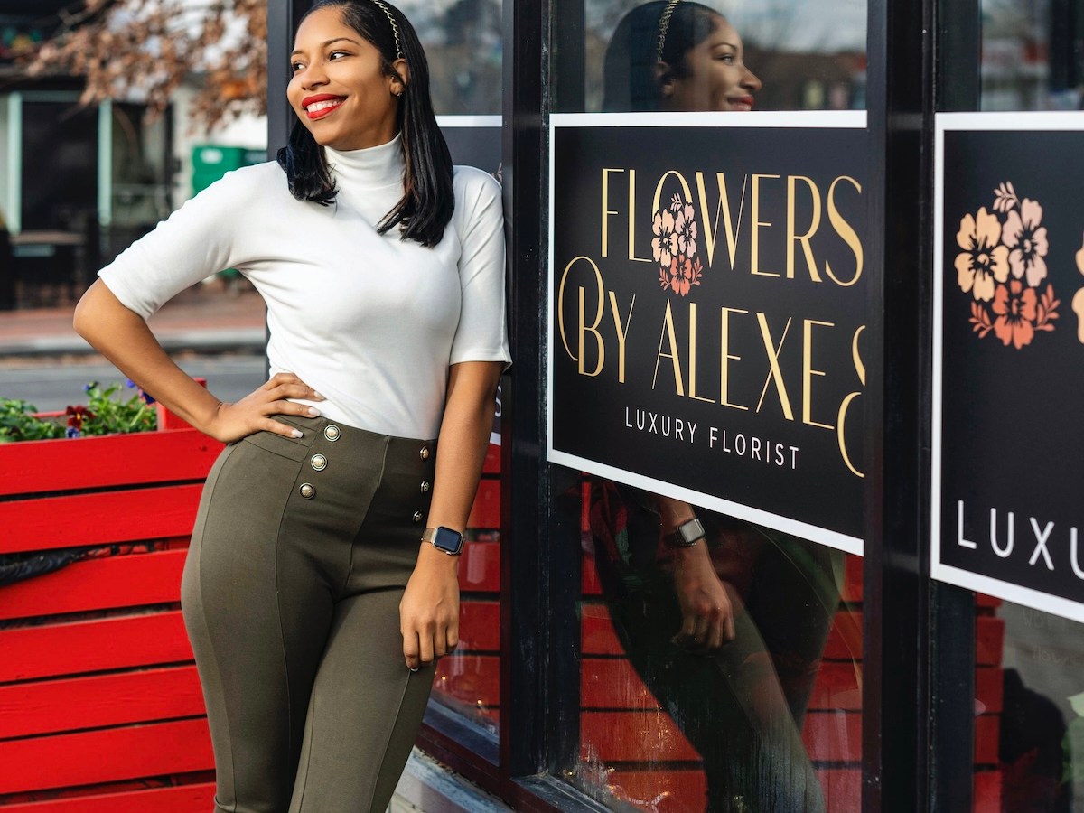 Alexes Haggins stands outside of her business, Flowers by Alexes. (Courtesy of Alexes Haggins)