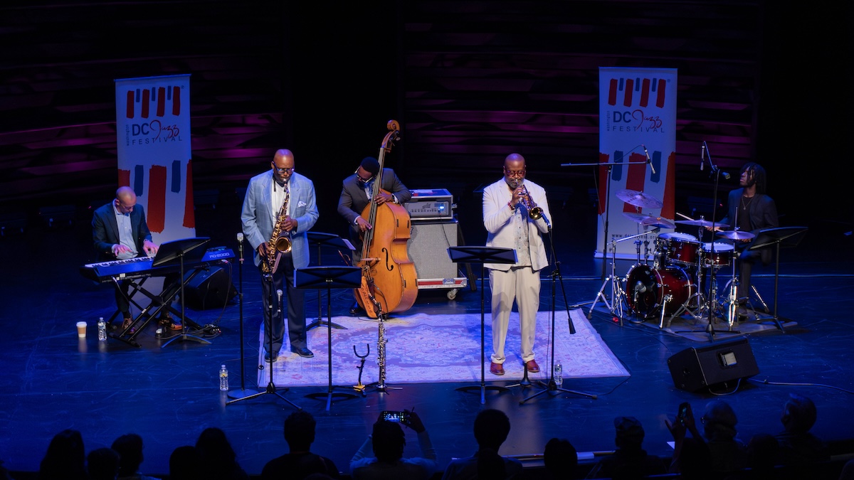 "Footprints of Wayne Shorter" was recently presented by the DC Jazz Festival in the Arena Stage Kogod Cradle in southwest D.C. Performing was the Paul Carr Quintet with special guest Sean Jones. From left is pianist Ryan Hansler, saxophonist Paul Carr, bassist William ‘Mo Betta’ Ledbetter, trumpeter Sean Jones, and drummer Kevin Kearney Jr. (Courtesy of DC Jazz Festival)