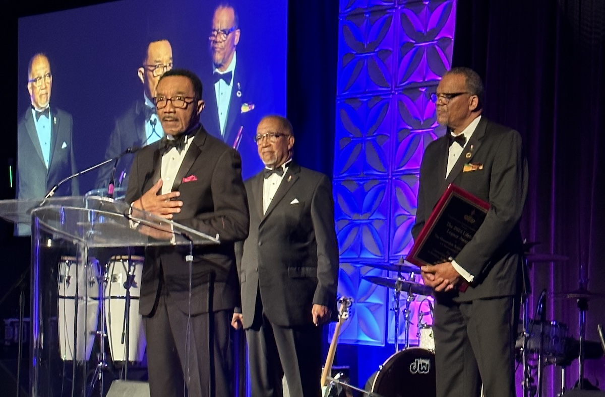 From left: U.S. Rep. Kweisi Mfume, a Democrat from Baltimore, accepts an award for his service from the National Newspaper Publishers Association (NNPA), presented by NNPA President and CEO Benjamin F. Chavis and the association’s chairman Bobby Henry Sr. (Roy Lewis/The Washington Informer)
