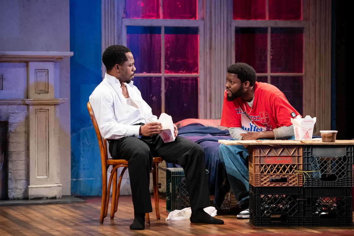 From left: Ro Boddie portrays Lincoln and Yao Dogbe is Booth in "Topdog/Underdog" at the Round House Theatre. (Courtesy of Margot Schulman Photography)