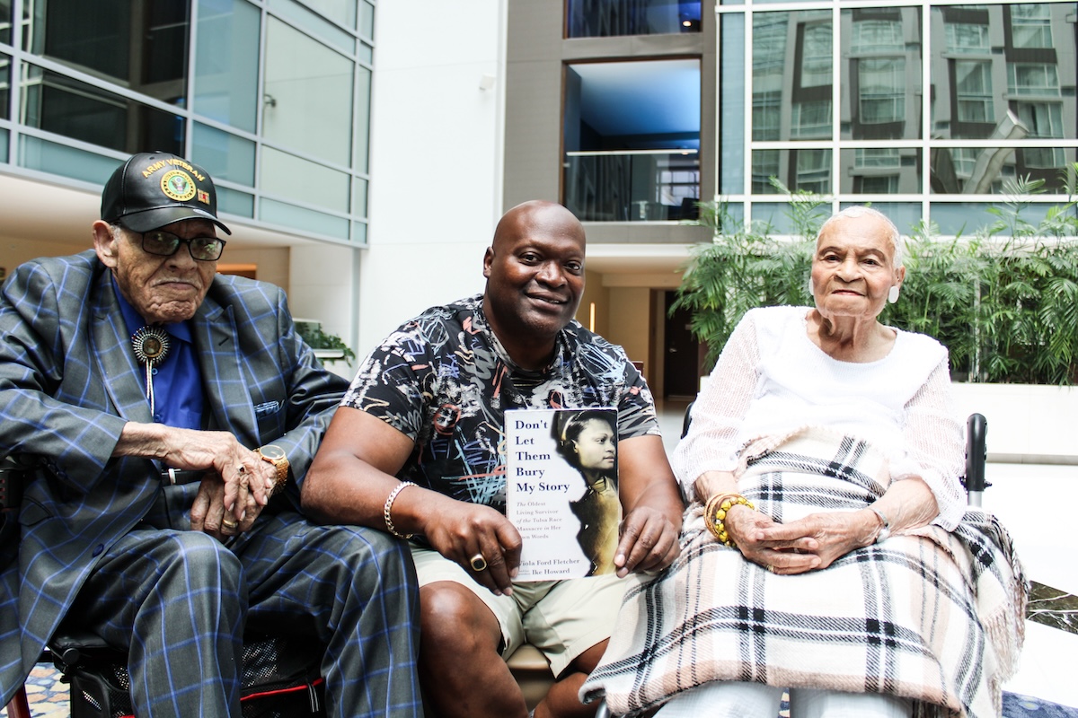 **FILE** From left: Hughes Van Ellis, a since-deceased survivor of the Tulsa race massacre, Ike Howard and Viola Ford Fletcher, the oldest living survivor of the Tulsa Race Massacre and author of "Don't Let Them Bury My Story,” pose at the 2023 Congressional Black Caucus Foundation’s Annual Legislative Conference. Van Ellis was Fletcher’s brother and Howard is her grandson. (WI photo)
