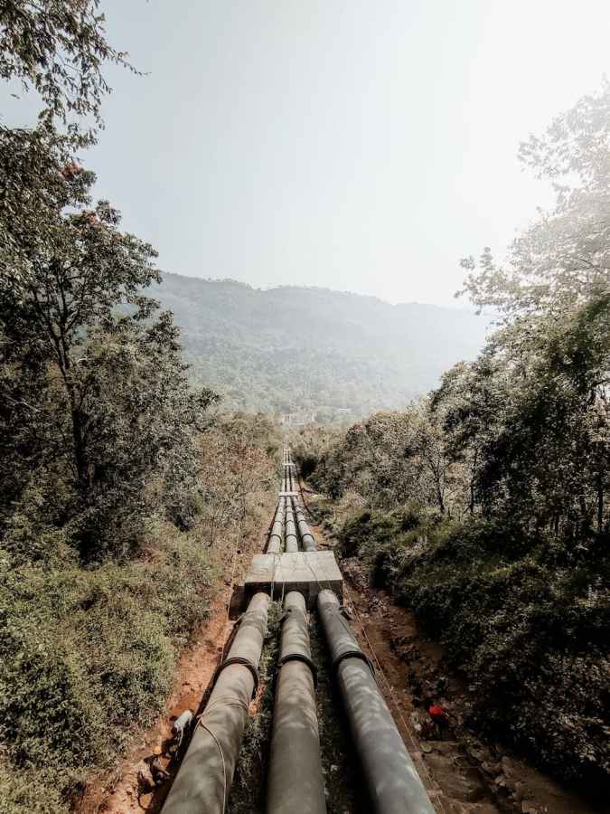 pipeline among trees in mountains