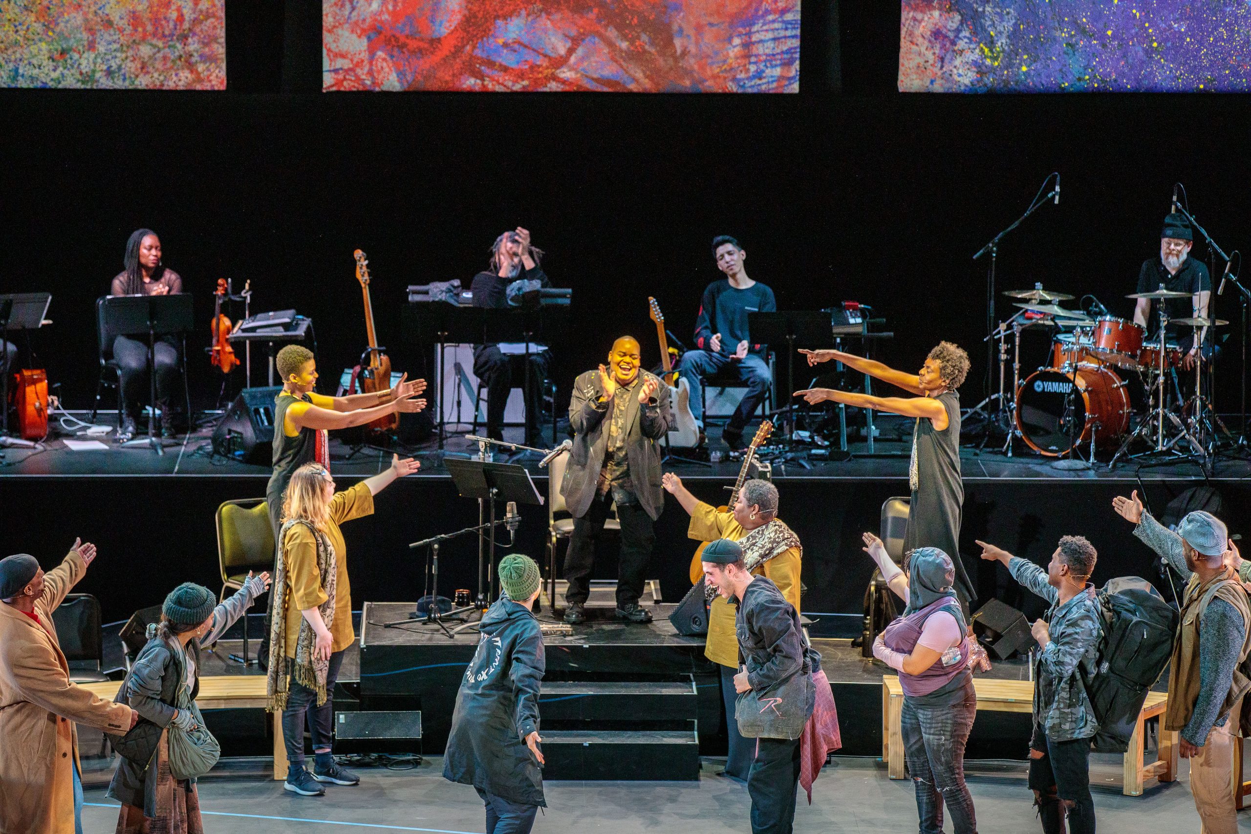 The full ensemble of "Parable of the Sower," an opera based on Octavia Butler's novel, composed by Bernice Johnson Reagon and her daughter Toshi Reagon (center stage), is seen here. The production was presented in 2022 at the Strathmore in North Bethesda, Maryland. (Courtesy of Shana Gerber)