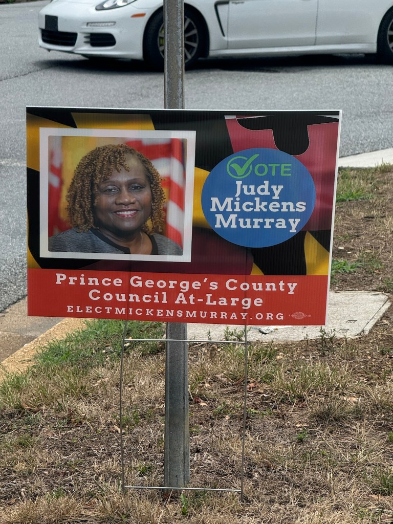 Former Board of Education Chair Judy Mickens-Murray now has yard signs. During a recent forum, she said her primary issue is accountability to her constituents. (Anthony Tilghman/The Washington Informer)