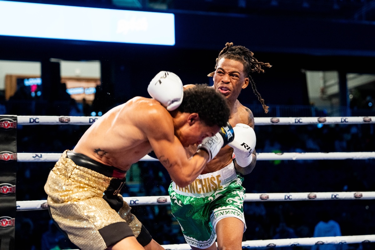 **FILE** Davis Boxing Promotions presents Strap Season on Saturday, Aug. 3, at the Entertainment and Sports Arena in Southeast D.C., featuring Frankie "Franchise" Scarboro, who is landing a punch against his opponent Jose Rodriguez Crespo in May. (Abdullah Konte/The Washington Informer)
