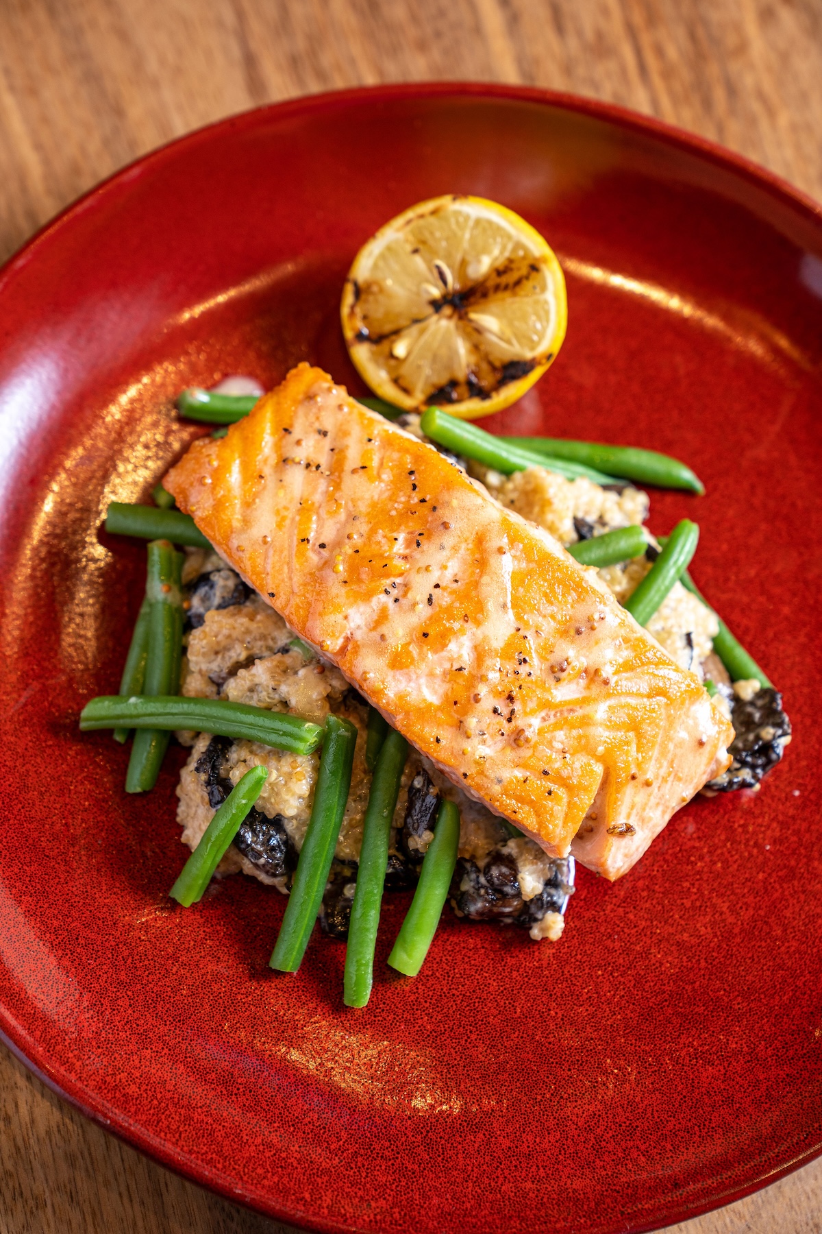 Makers Union serves a Hickory House Smoked Salmon over creamy mushroom quinoa, green beans, and mustard vinaigrette. (Courtesy of Makers Union)